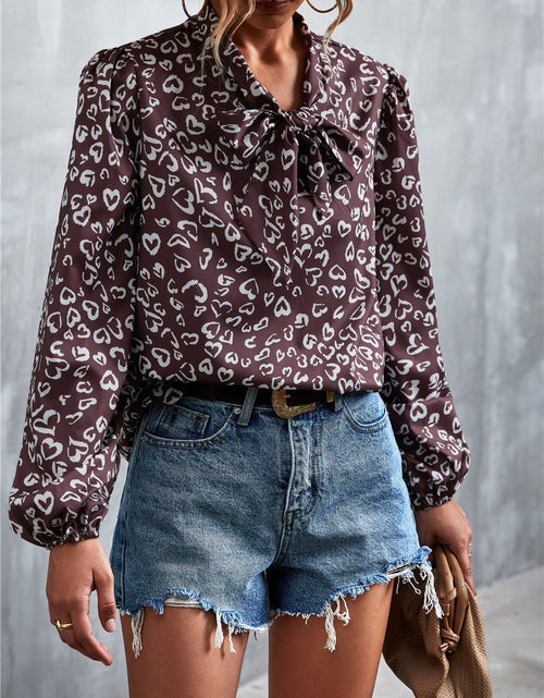 Load image into Gallery viewer, Printed Tie Neck Puff Sleeve Blouse
