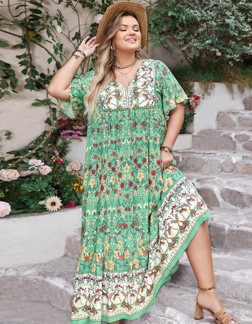 Load image into Gallery viewer, Plus Size Floral Tie Neck Flutter Sleeve Maxi Dress
