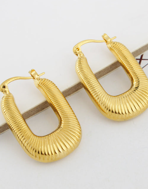 Load image into Gallery viewer, 14K Gold Oval Diamond Cut Bamboo Hoop Earring
