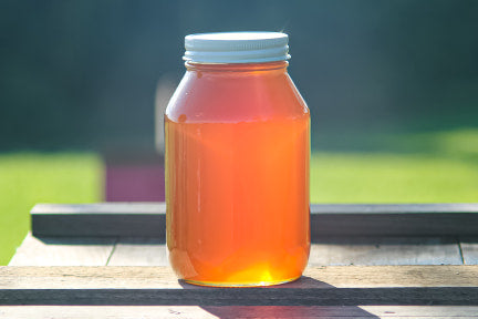 Load image into Gallery viewer, Raw Wildflower Honey 48oz
