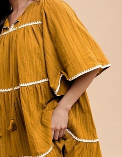 Load image into Gallery viewer, Annie Wear Tassel Contrast Trim Tie Neck Half Sleeve Tiered Dress
