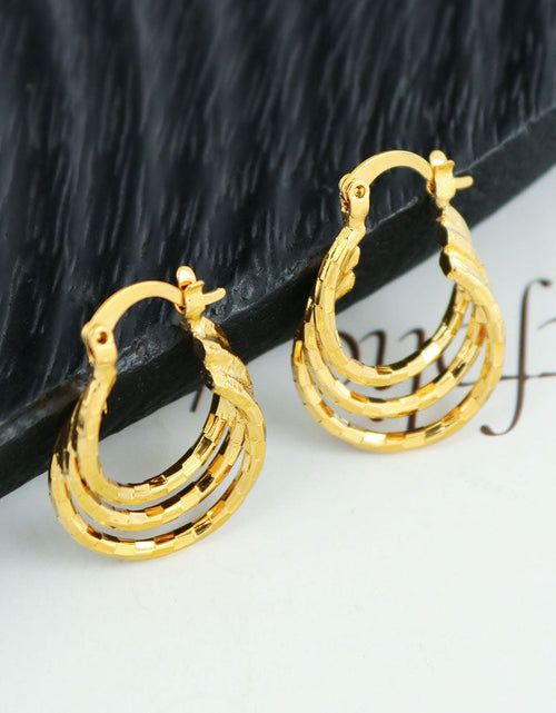Load image into Gallery viewer, 14k Diamond Cut Swirl Hoop Earrings
