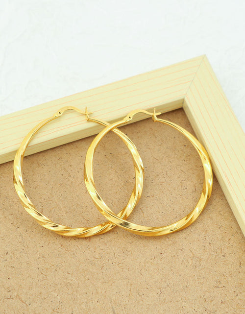 Load image into Gallery viewer, 14K Gold Large Twist Hoop Earrings 60mm
