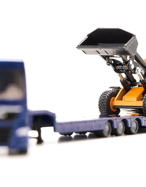 Load image into Gallery viewer, MAN Truck Blue Metallic with Low Loader Trailer and JCB 457 Wheel Loader Yellow 1/87 (HO) Diecast Model by Siku

