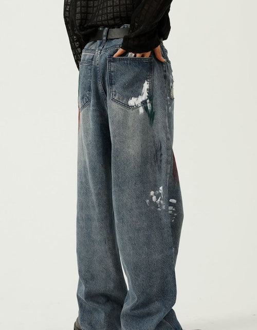 Load image into Gallery viewer, Washed Distressed Wide-Leg Jeans
