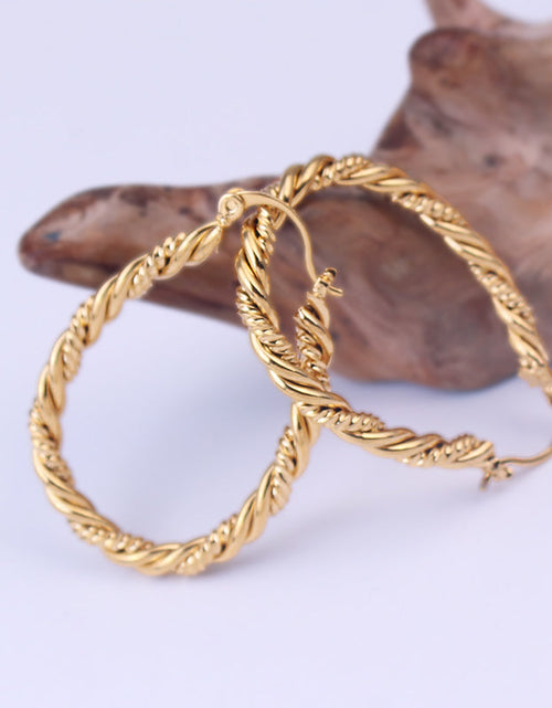 Load image into Gallery viewer, 14k Yellow Gold Large Oval Twisted Hoop Earrings
