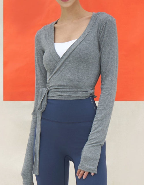 Load image into Gallery viewer, Tied Surplice Long Sleeve Top
