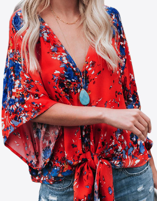 Load image into Gallery viewer, Shiny Printed Deep V Tie Hem Blouse
