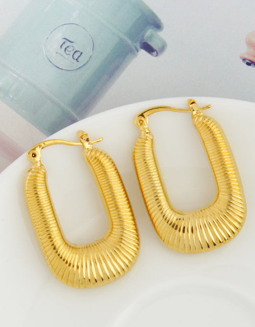 Load image into Gallery viewer, 14k Gold Flat Oval Hoop earrings (Copy)
