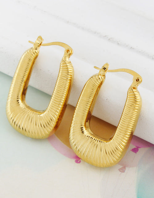 Load image into Gallery viewer, 14k Gold Flat Oval Hoop earrings (Copy)
