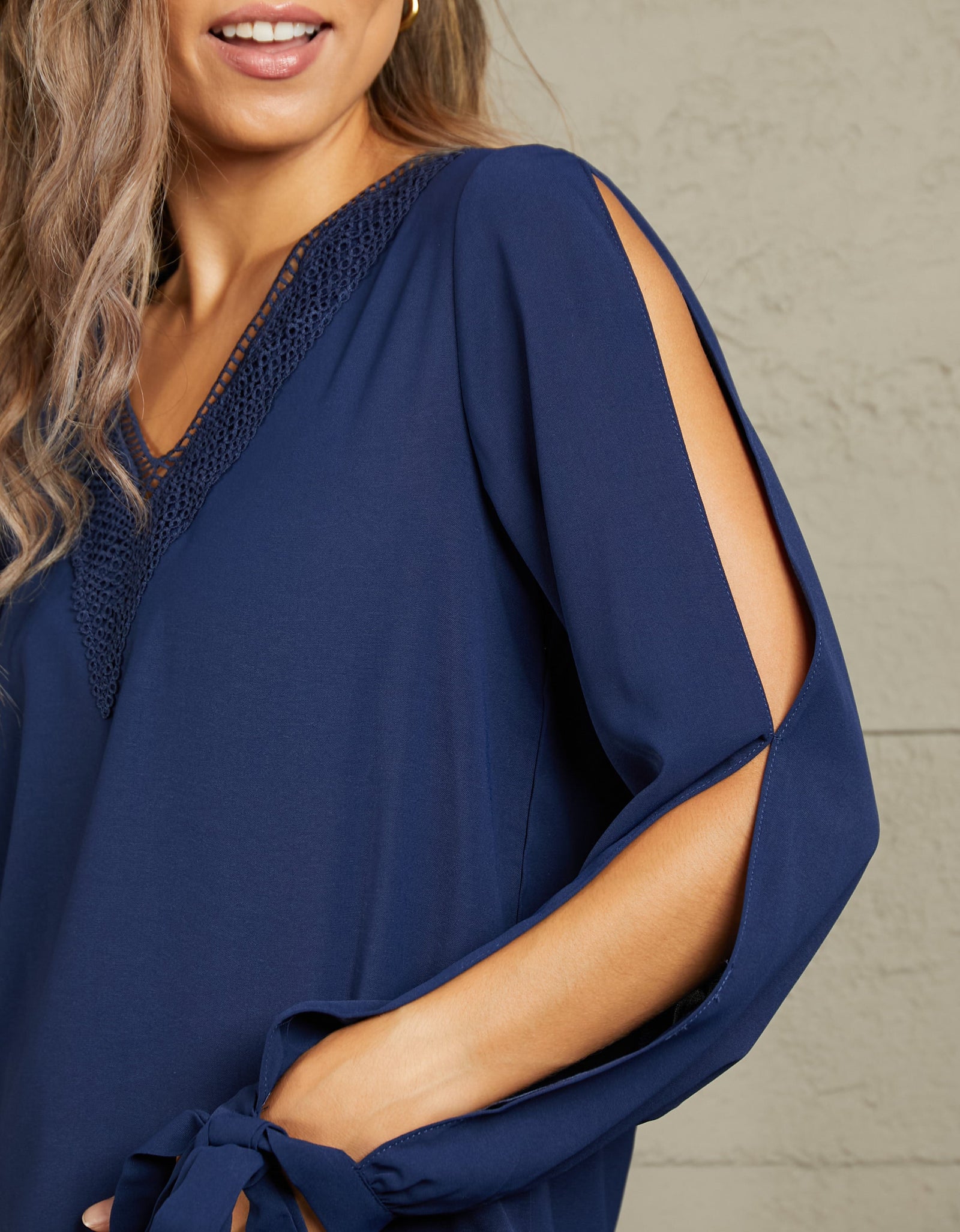 Perfee V-Neck Tie Cuff Slit Blouse