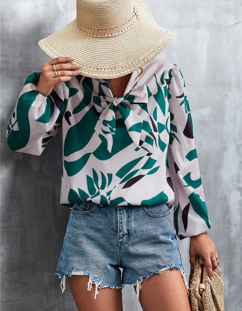 Load image into Gallery viewer, Printed Tie Neck Puff Sleeve Blouse
