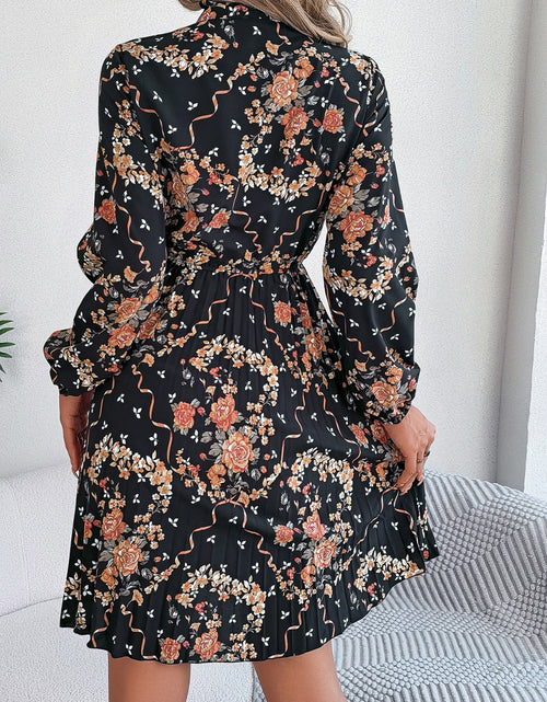 Load image into Gallery viewer, Pleated Printed Tie Neck Long Sleeve Dress
