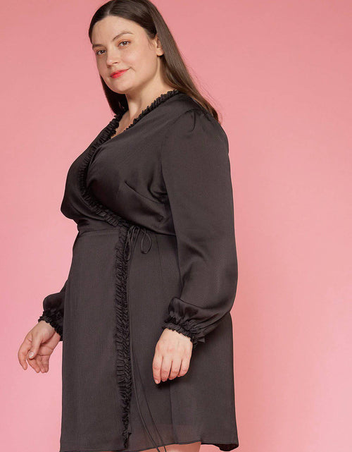 Load image into Gallery viewer, Plus Size Ruffle Trim Long Sleeve Wrap Dress in Black by Shop at Konus

