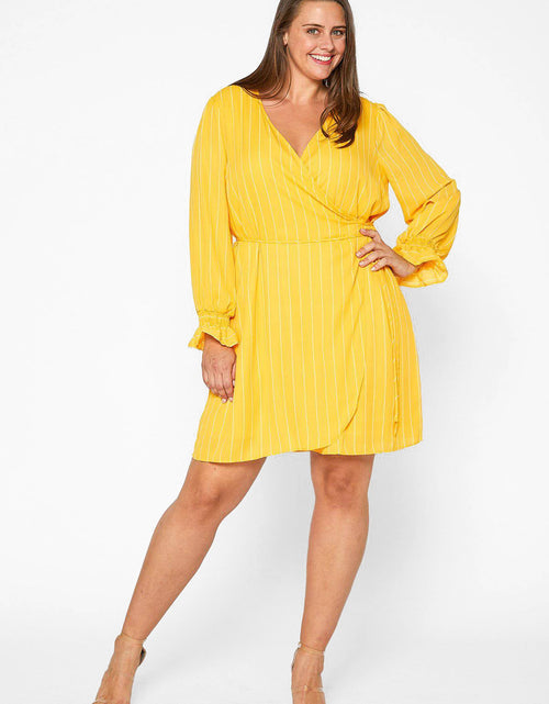 Load image into Gallery viewer, Plus Size Smocked Bell Sleeve Wrap Dress in Yellow by Shop at Konus
