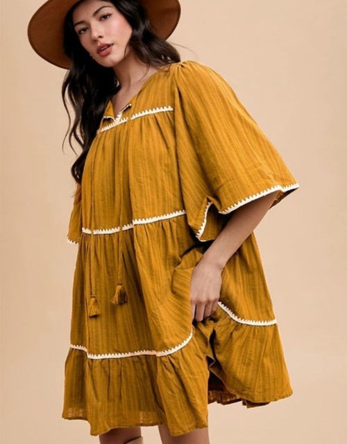 Load image into Gallery viewer, Annie Wear Tassel Contrast Trim Tie Neck Half Sleeve Tiered Dress
