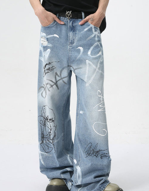 Load image into Gallery viewer, Mid Rise Graffiti Print Distressed Wide Leg Jeans
