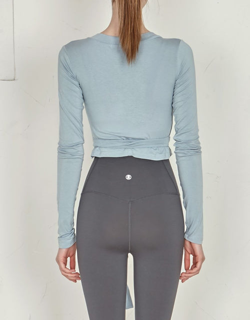 Load image into Gallery viewer, Tied Surplice Long Sleeve Top
