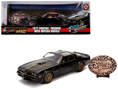 Load image into Gallery viewer, 1977 Pontiac Firebird Trans Am Black with Replica Buckle "Smokey and the Bandit" (1977) Movie "Hollywood Rides" Series 1/24 Diecast Model Car by Jada
