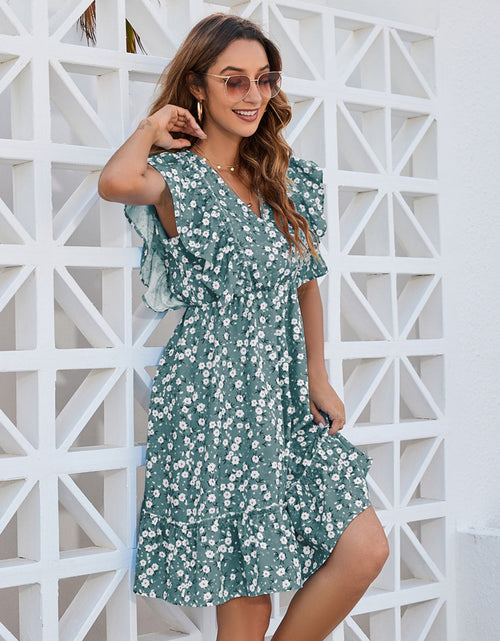 Load image into Gallery viewer, Ruffled Ditsy Floral Surplice Mini Dress

