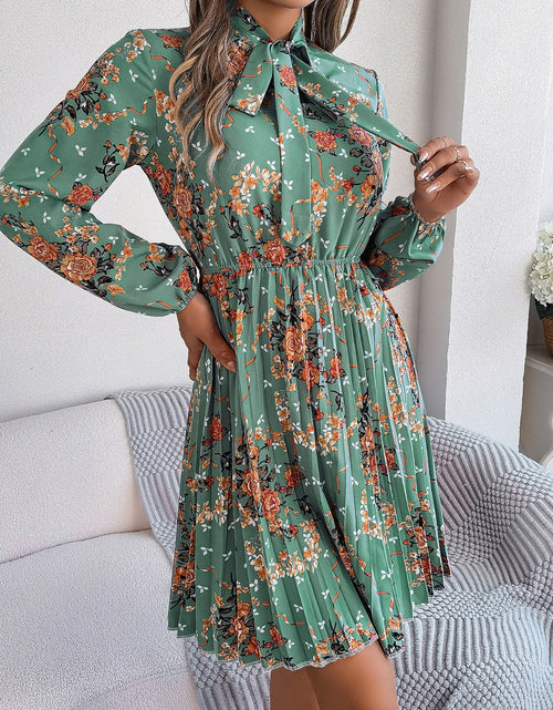 Load image into Gallery viewer, Pleated Printed Tie Neck Long Sleeve Dress
