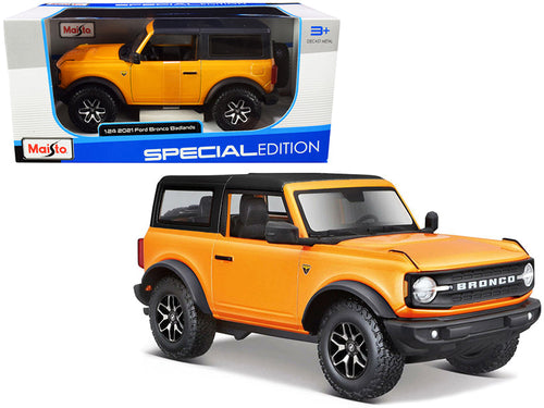Load image into Gallery viewer, 2021 Ford Bronco Badlands Orange Metallic with Black Top "Special Edition" 1/24 Diecast Model Car by Maisto
