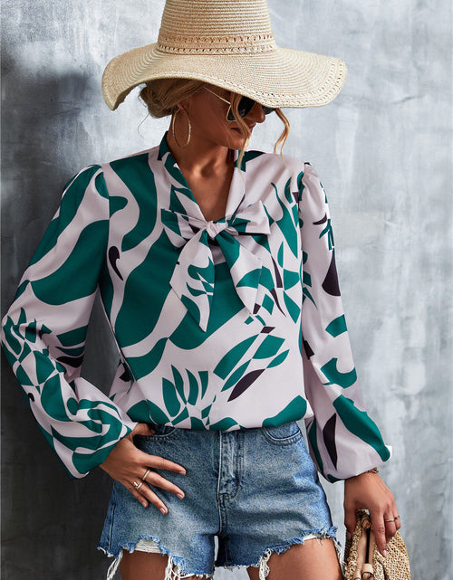 Load image into Gallery viewer, Printed Tie Neck Puff Sleeve Blouse
