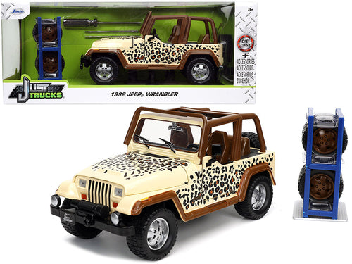 Load image into Gallery viewer, 1992 Jeep Wrangler Tan and Brown with Graphics and Extra Wheels "Just Trucks" Series 1/24 Diecast Model Car by Jada
