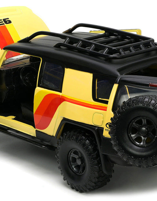 Load image into Gallery viewer, Toyota FJ Cruiser #938 Cream with Matt Black Top with Roof Rack and Stripes "KC Hilites" with Extra Wheels "Just Trucks" Series 1/24 Diecast Model Car by Jada
