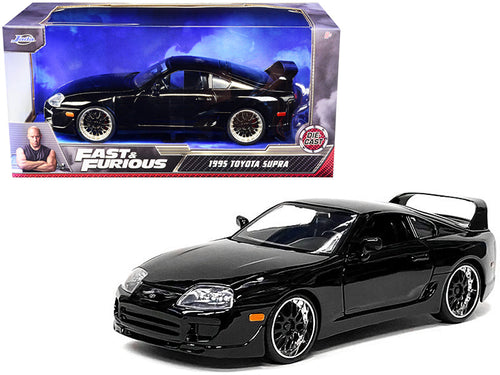 Load image into Gallery viewer, 1995 Toyota Supra Black "Fast &amp; Furious" Movie 1/24 Diecast Model Car by Jada
