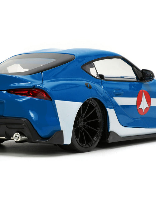 Load image into Gallery viewer, 2020 Toyota Supra Blue with Graphics and Max Sterling Diecast Figurine "Robotech" "Hollywood Rides" Series 1/24 Diecast Model Car by Jada
