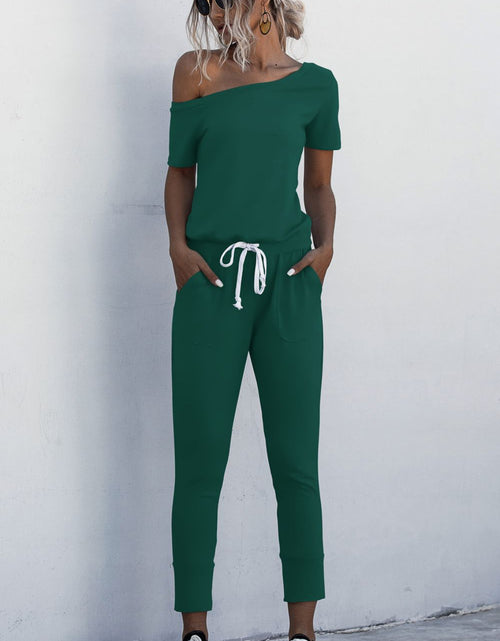 Load image into Gallery viewer, Asymmetrical Neck Tied Jumpsuit with Pockets
