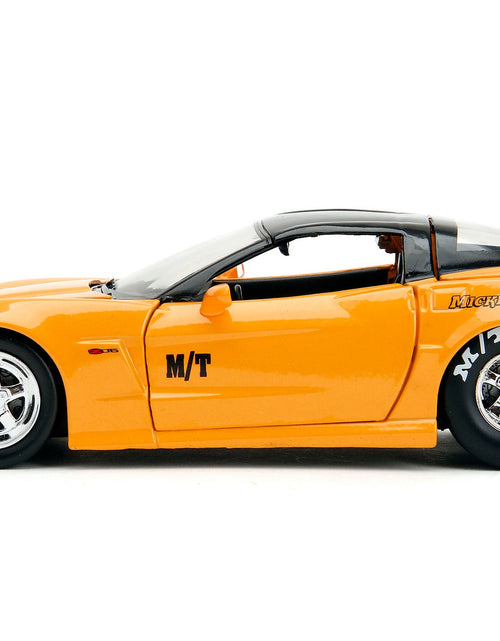 Load image into Gallery viewer, 2006 Chevrolet Corvette Yellow with Black Top "Mickey Thompson" "Bigtime Muscle" Series 1/24 Diecast Model Car by Jada
