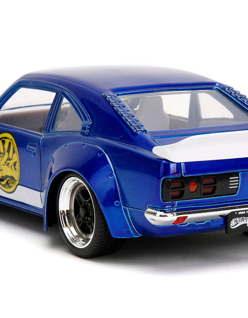 Load image into Gallery viewer, 1974 Mazda RX-3 Candy Blue with White Interior and Graphics and Blue Ranger Diecast Figure "Power Rangers" "Hollywood Rides" Series 1/24 Diecast Model Car by Jada
