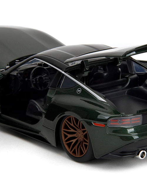 Load image into Gallery viewer, 2023 Nissan Z Dark Green Metallic with Black Top "Fast X" (2023) Movie "Fast &amp; Furious" Series 1/24 Diecast Model Car by Jada

