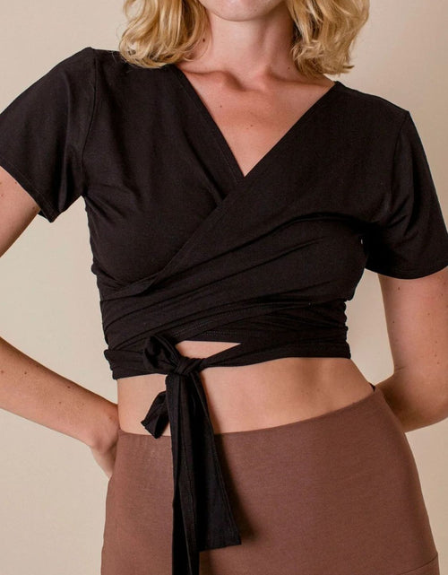 Load image into Gallery viewer, Tied Surplice Short Sleeve Top
