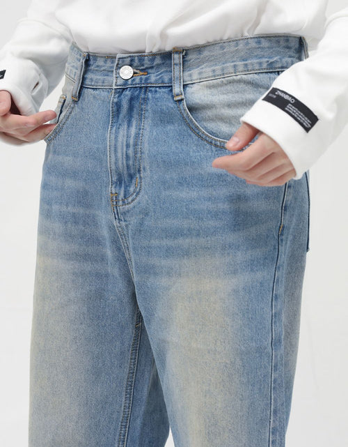 Load image into Gallery viewer, Washed Mid Rise Jeans with Pockets

