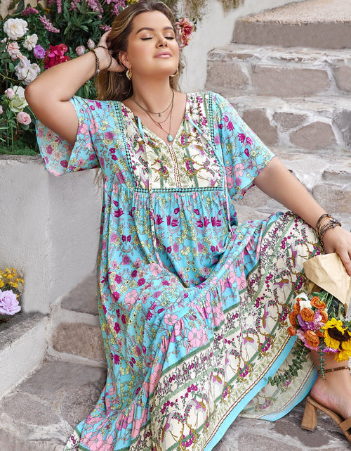 Load image into Gallery viewer, Plus Size Printed Tie Neck Flutter Sleeve Maxi Dress
