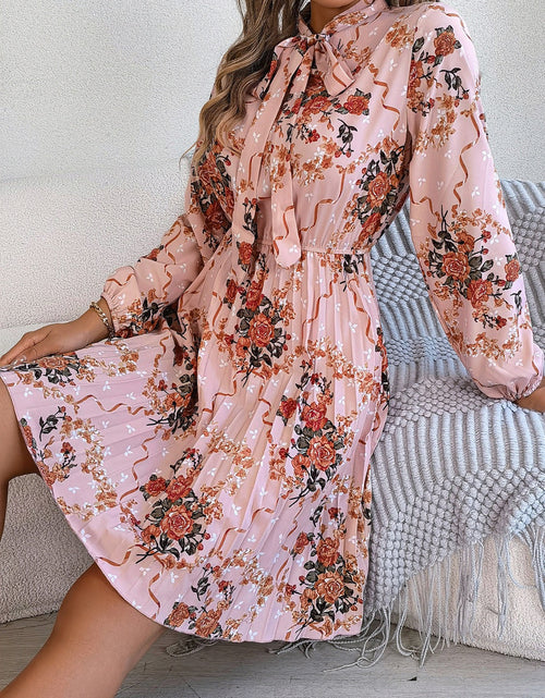 Load image into Gallery viewer, Pleated Printed Tie Neck Long Sleeve Dress
