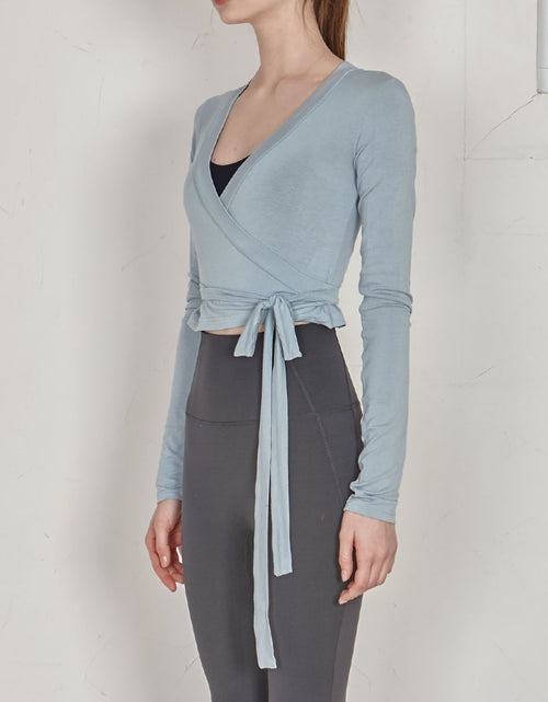 Load image into Gallery viewer, Tied Surplice Long Sleeve Top
