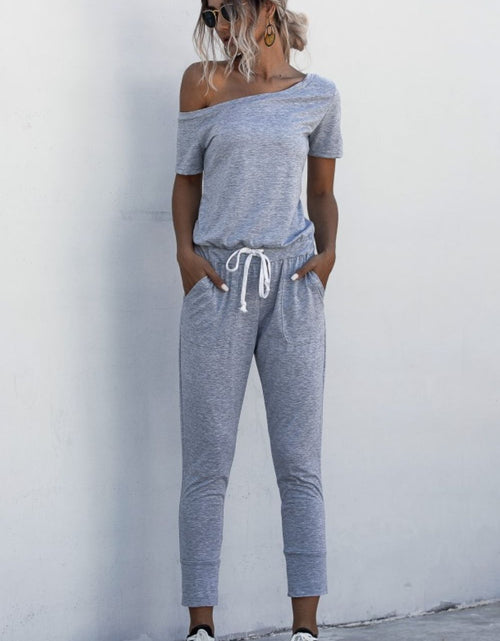 Load image into Gallery viewer, Asymmetrical Neck Tied Jumpsuit with Pockets
