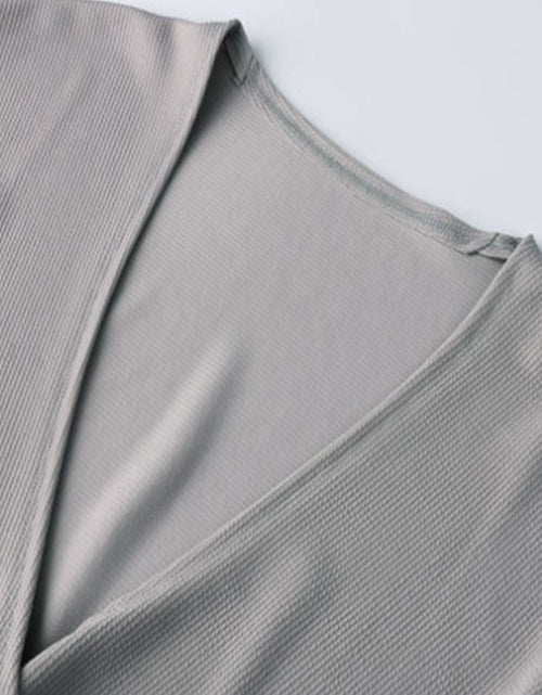 Load image into Gallery viewer, Ivy Lane Ribbed Surplice Neck Slit Top
