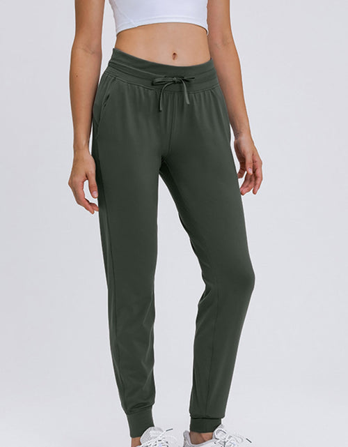 Load image into Gallery viewer, Millennia Double Take Tied Joggers with Pockets
