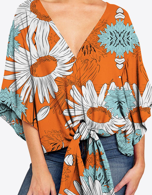 Load image into Gallery viewer, Shiny Printed Deep V Tie Hem Blouse
