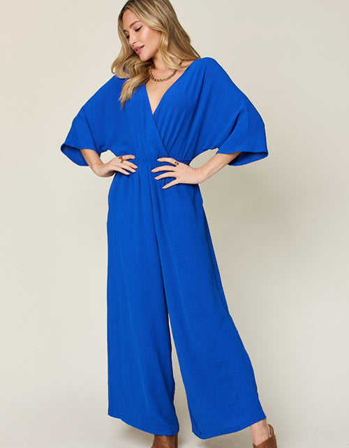 Load image into Gallery viewer, Double Take Full Size Surplice Wide Leg Jumpsuit with Pockets
