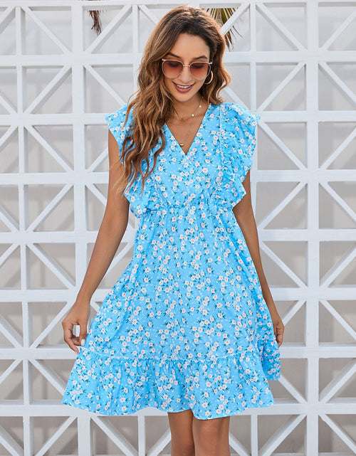 Load image into Gallery viewer, Ruffled Ditsy Floral Surplice Mini Dress
