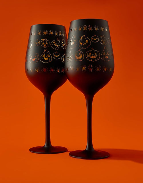 Load image into Gallery viewer, Crystal Halloween Stemmed Wine Glasses - Set of 2 - Pumpkin Themed Vibrant Black &amp; Gold Spooky Ghost Pattern Frosted Glass, Perfect for Themed Gothic Parties Trick Or Treat Gifts for Him Her (16 OZ) by The Wine Savant

