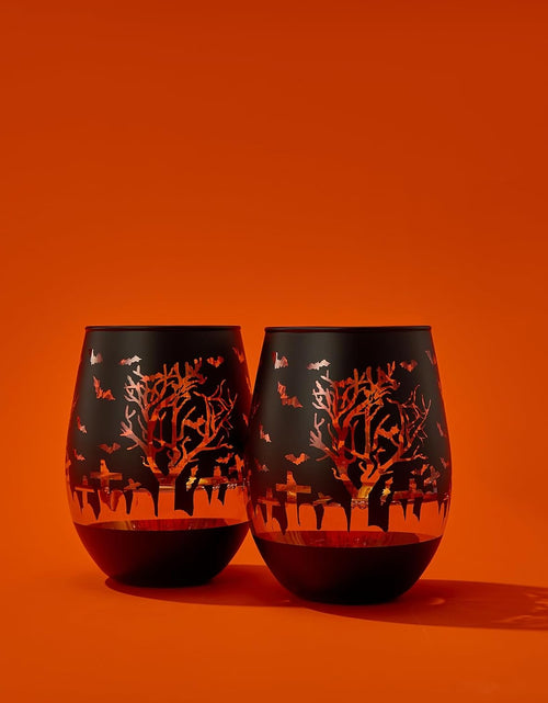 Load image into Gallery viewer, Crystal Halloween Stemless Wine Glass - Set of 2 - Themed Vibrant Black &amp; Gold Etched Spooky Graveyard Pattern Frosted Glass, Perfect for Themed Gothic Parties Trick Or Treat Gift For Him Her (16 OZ) by The Wine Savant
