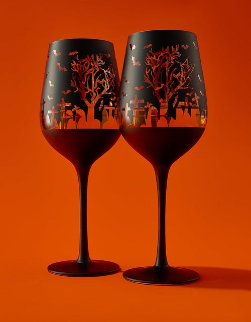 Load image into Gallery viewer, Crystal Halloween Stemmed Wine Glasses - Set of 2 - Themed Vibrant Black &amp; Gold Etched Spooky Graveyard Pattern Frosted Glass, Perfect for Themed Gothic Parties Trick Or Treat Gift For Him Her (14 OZ) by The Wine Savant
