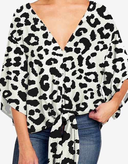 Load image into Gallery viewer, Shiny Printed Deep V Tie Hem Blouse
